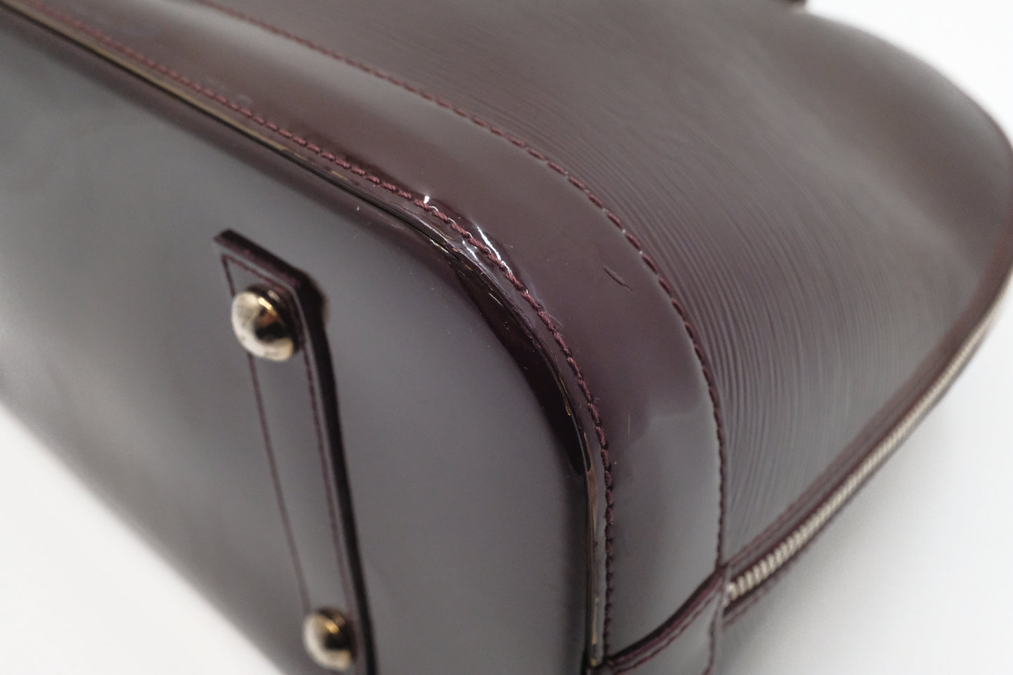Louis Vuitton Alma GM in Burgundy Electric Epi Leather