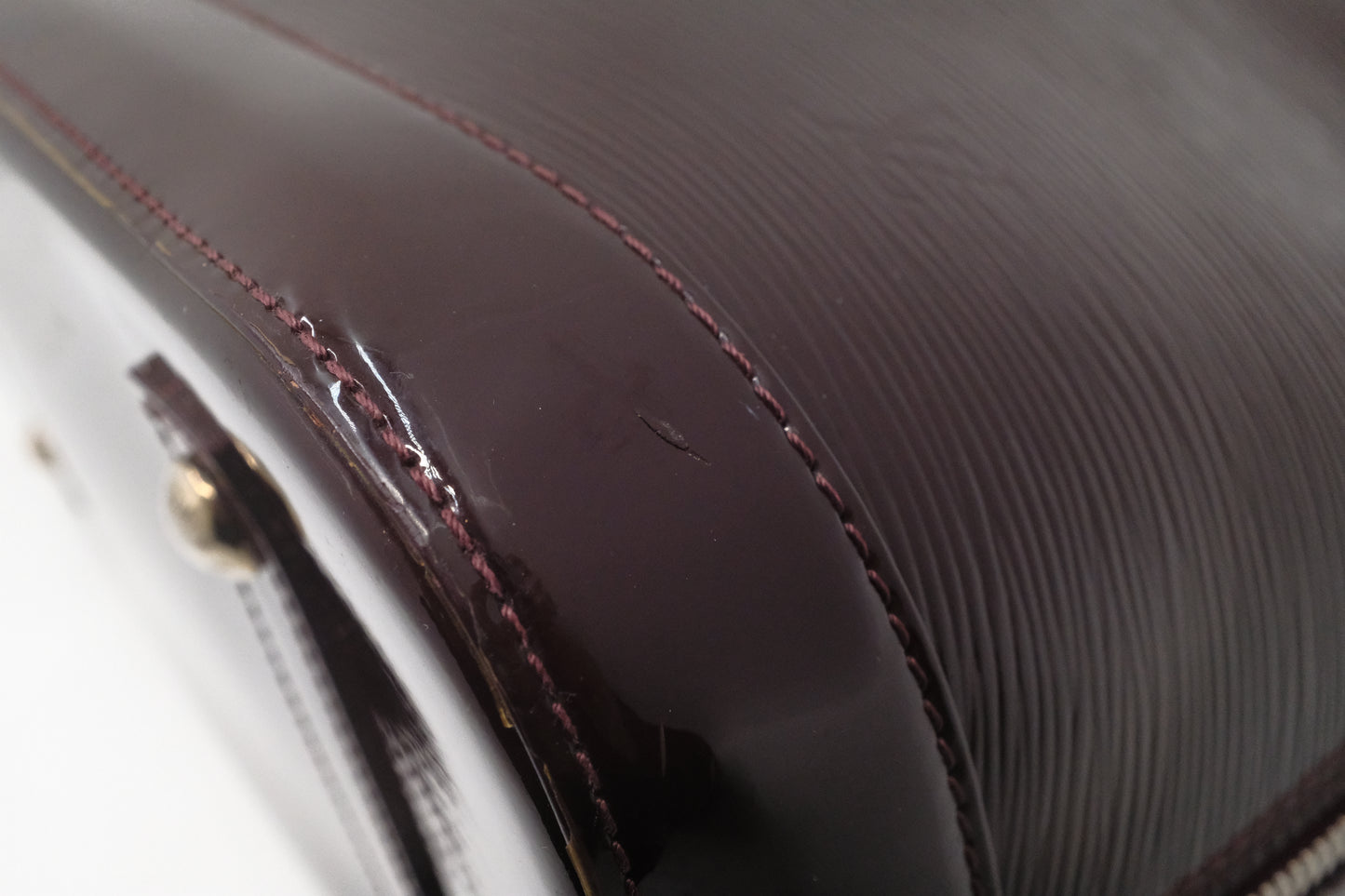 Louis Vuitton Alma GM in Burgundy Electric Epi Leather