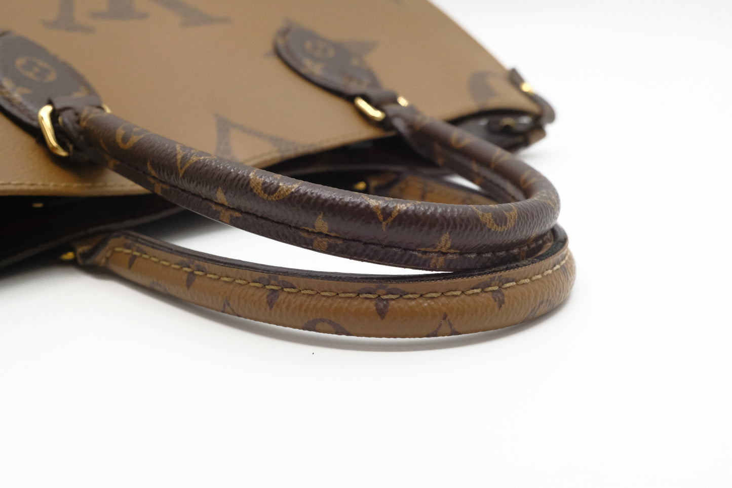 Louis Vuitton OnTheGo MM in Reverse Monogram Canvas