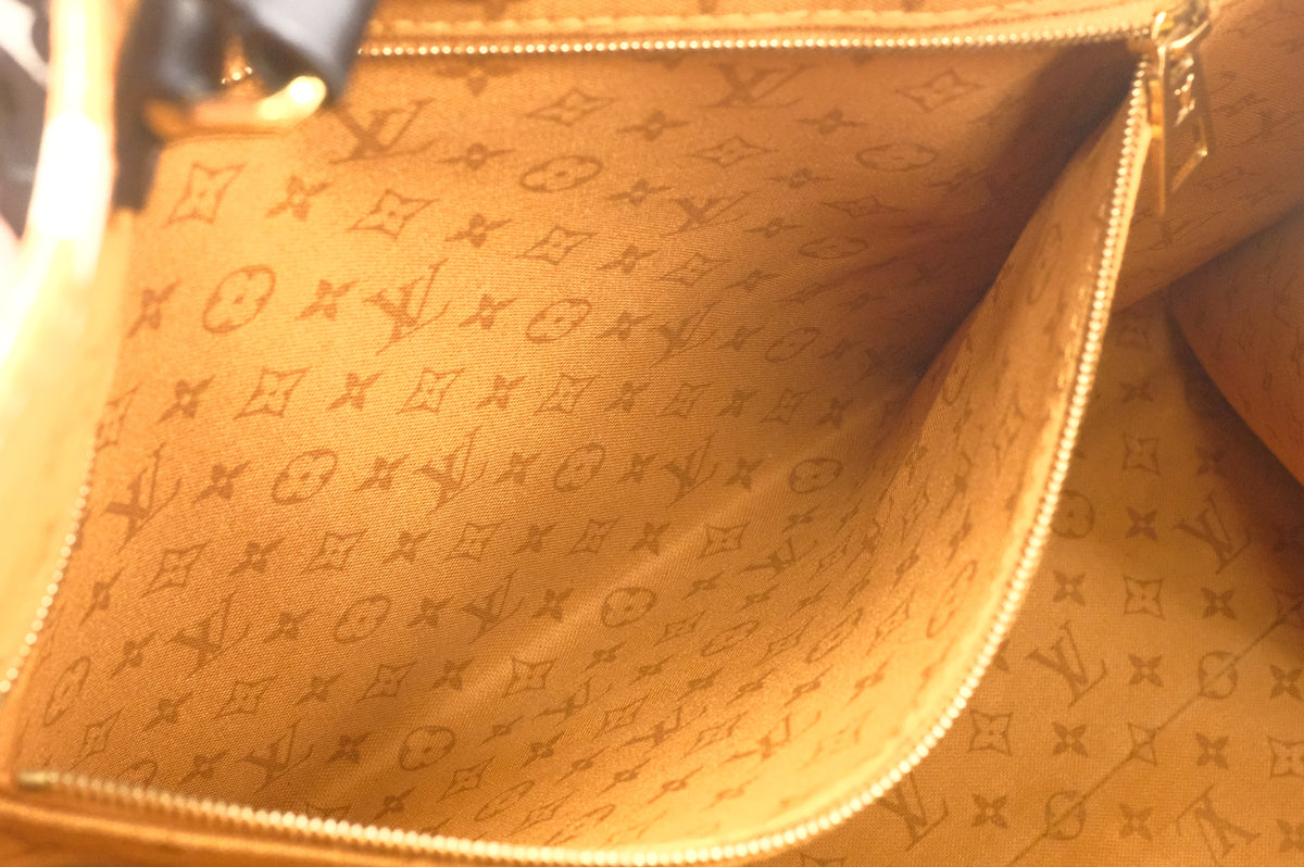 Louis Vuitton Crafty On The Go GM in Orange Canvas