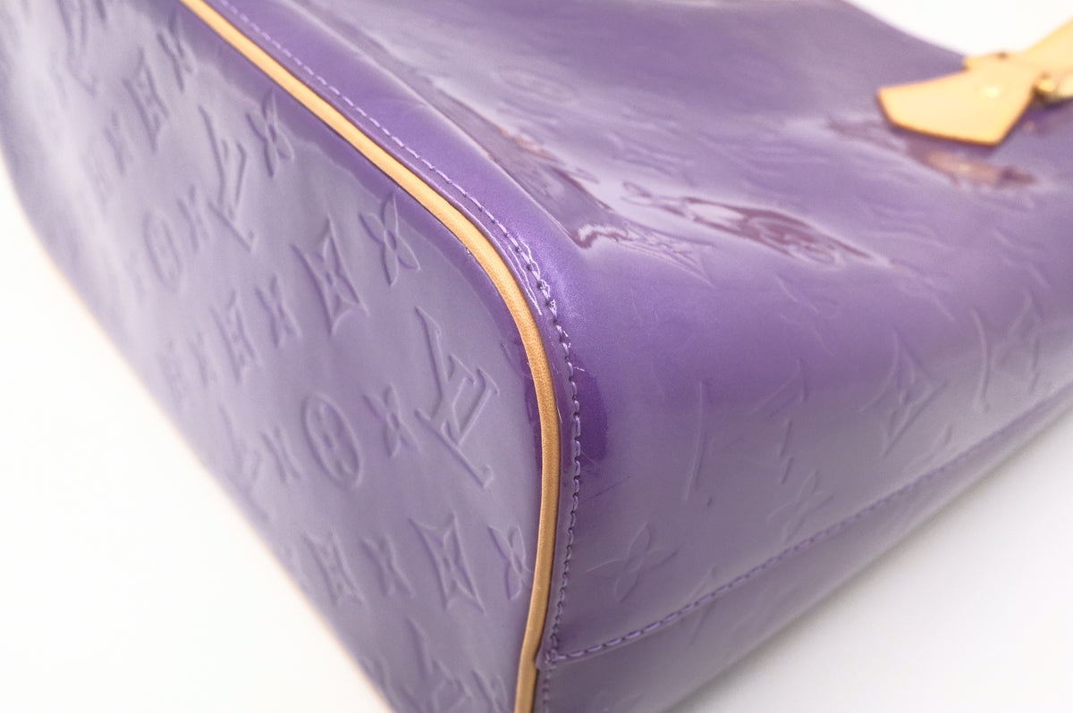 Louis Vuitton Houston in Purple Vernis Leather