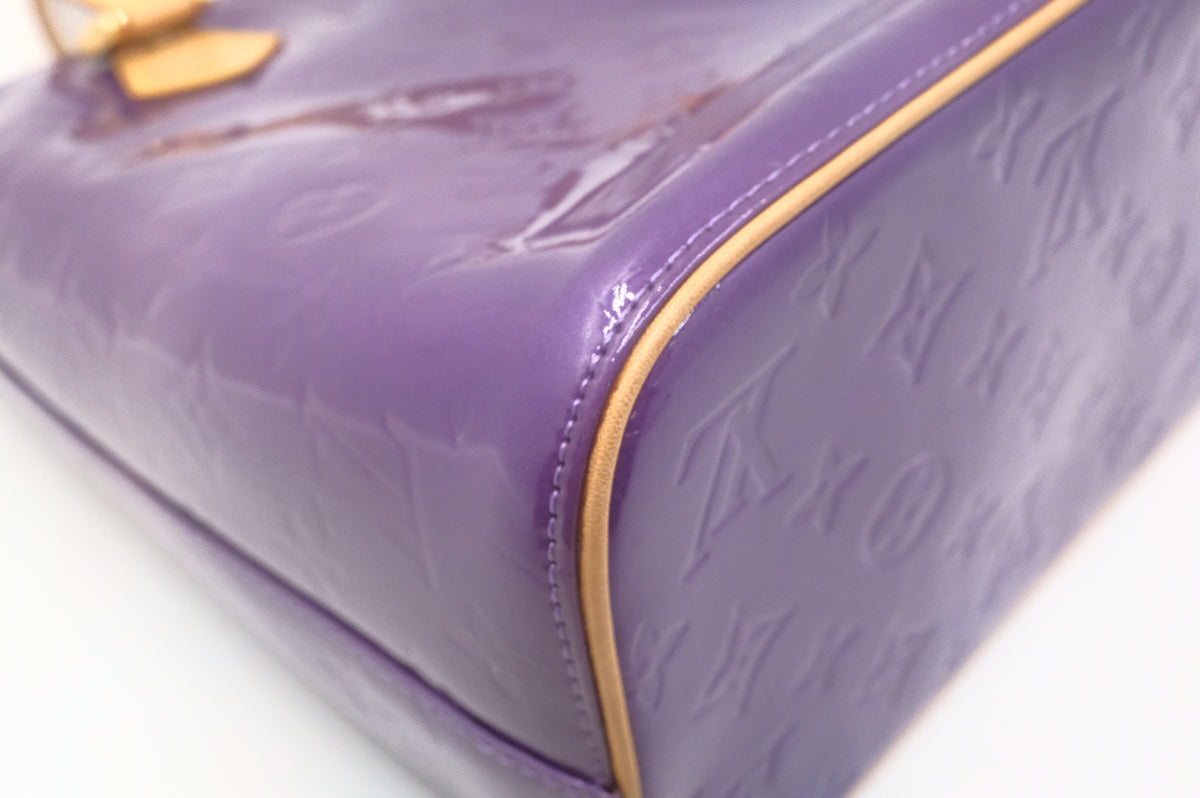 Louis Vuitton Houston in Purple Vernis Leather