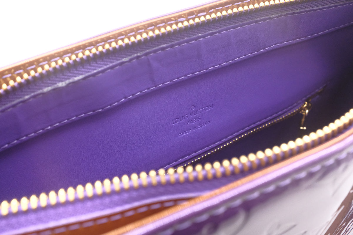 Louis Vuitton Houston in Purple Vernis Leather