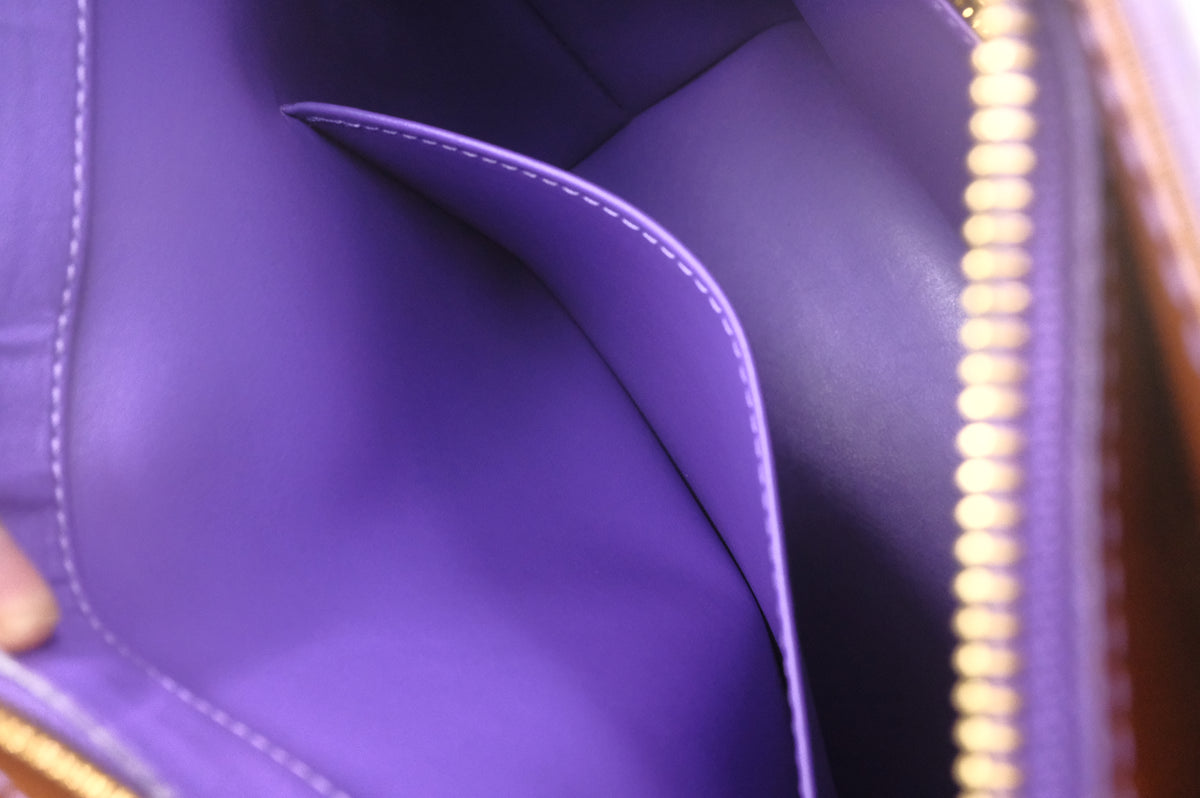 Louis Vuitton Houston in Purple Vernis Leather