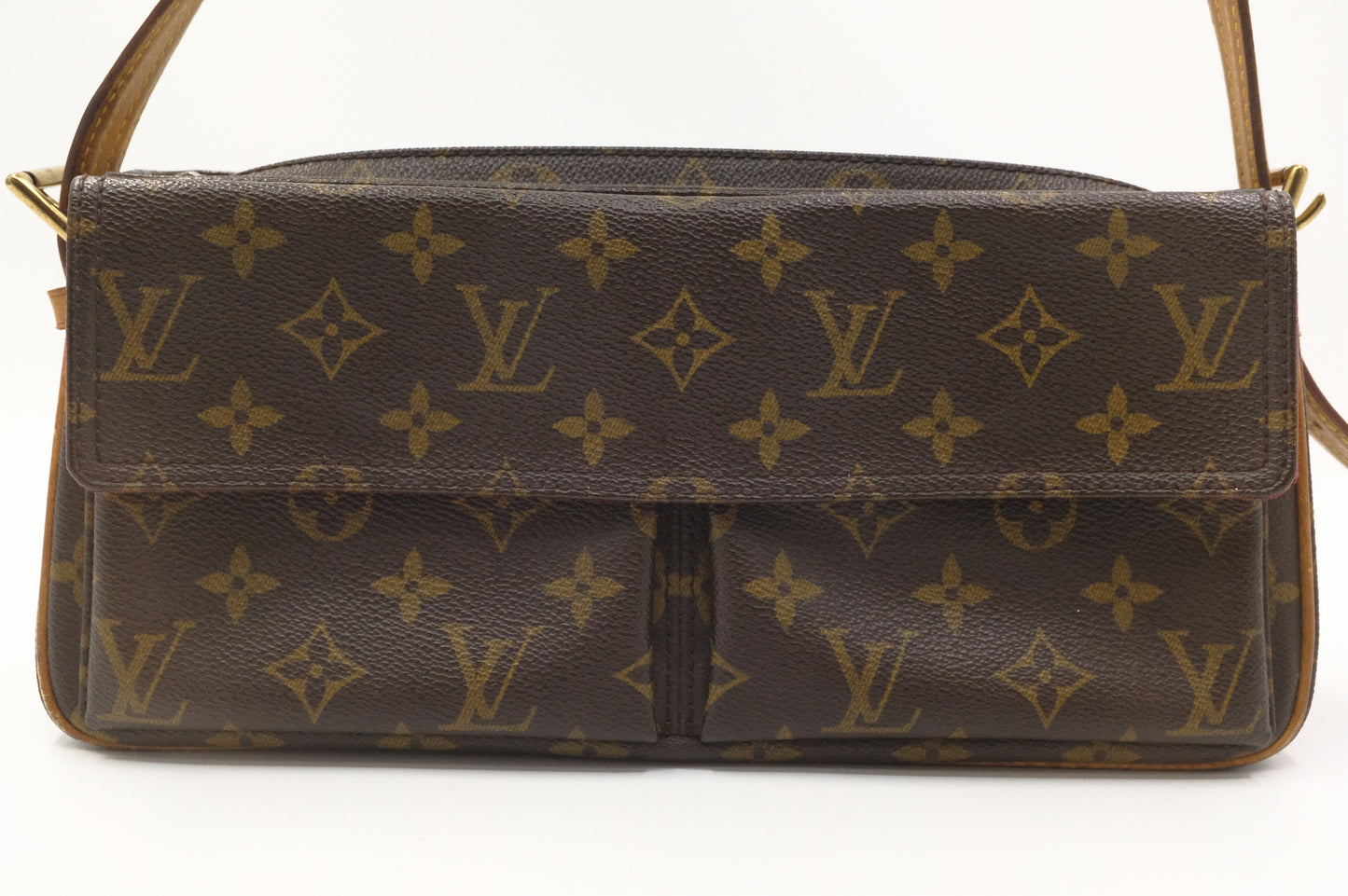 Louis Vuitton Vive Cite MM in Monogram Canvas