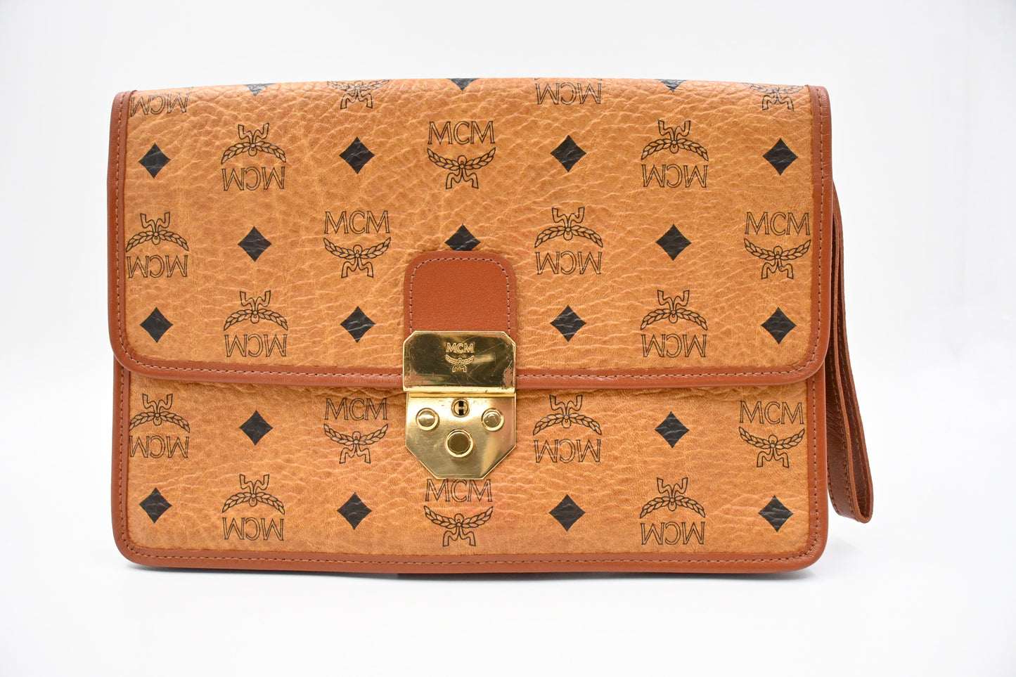 MCM Clutch Bag in Cognac Visetos Canvas