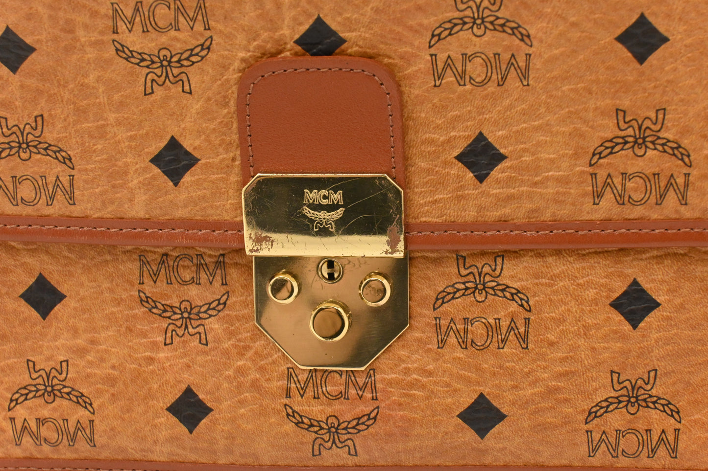 MCM Clutch Bag in Cognac Visetos Canvas