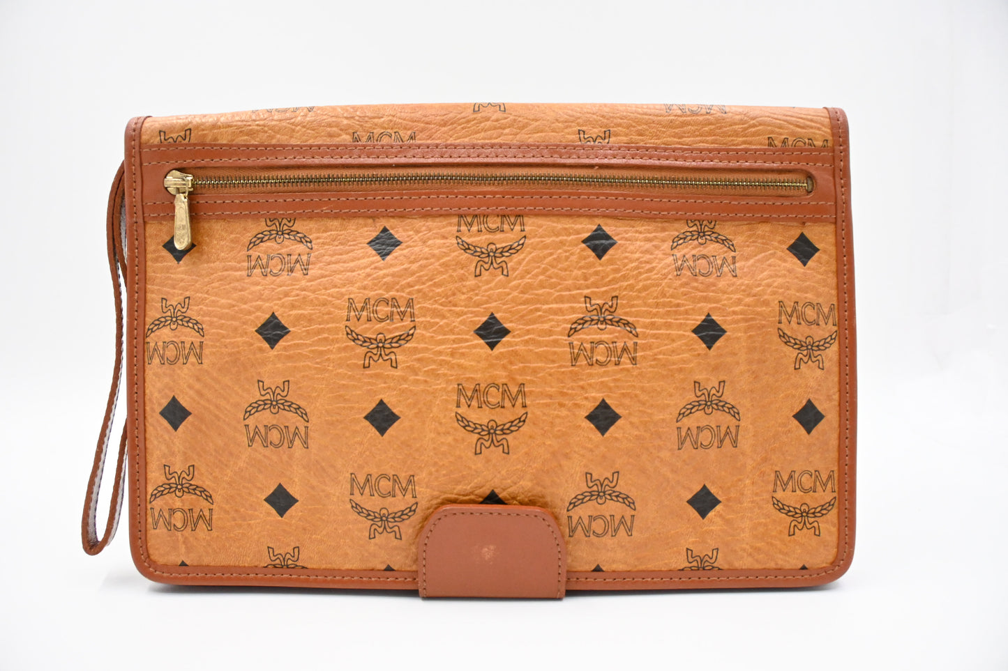MCM Clutch Bag in Cognac Visetos Canvas