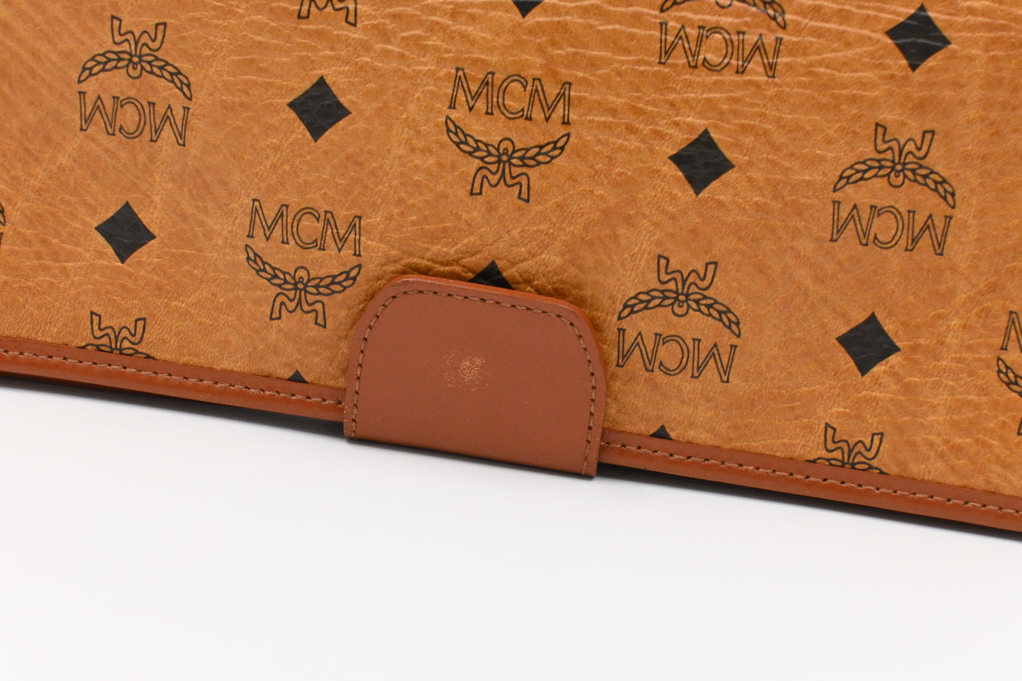 MCM Clutch Bag in Cognac Visetos Canvas