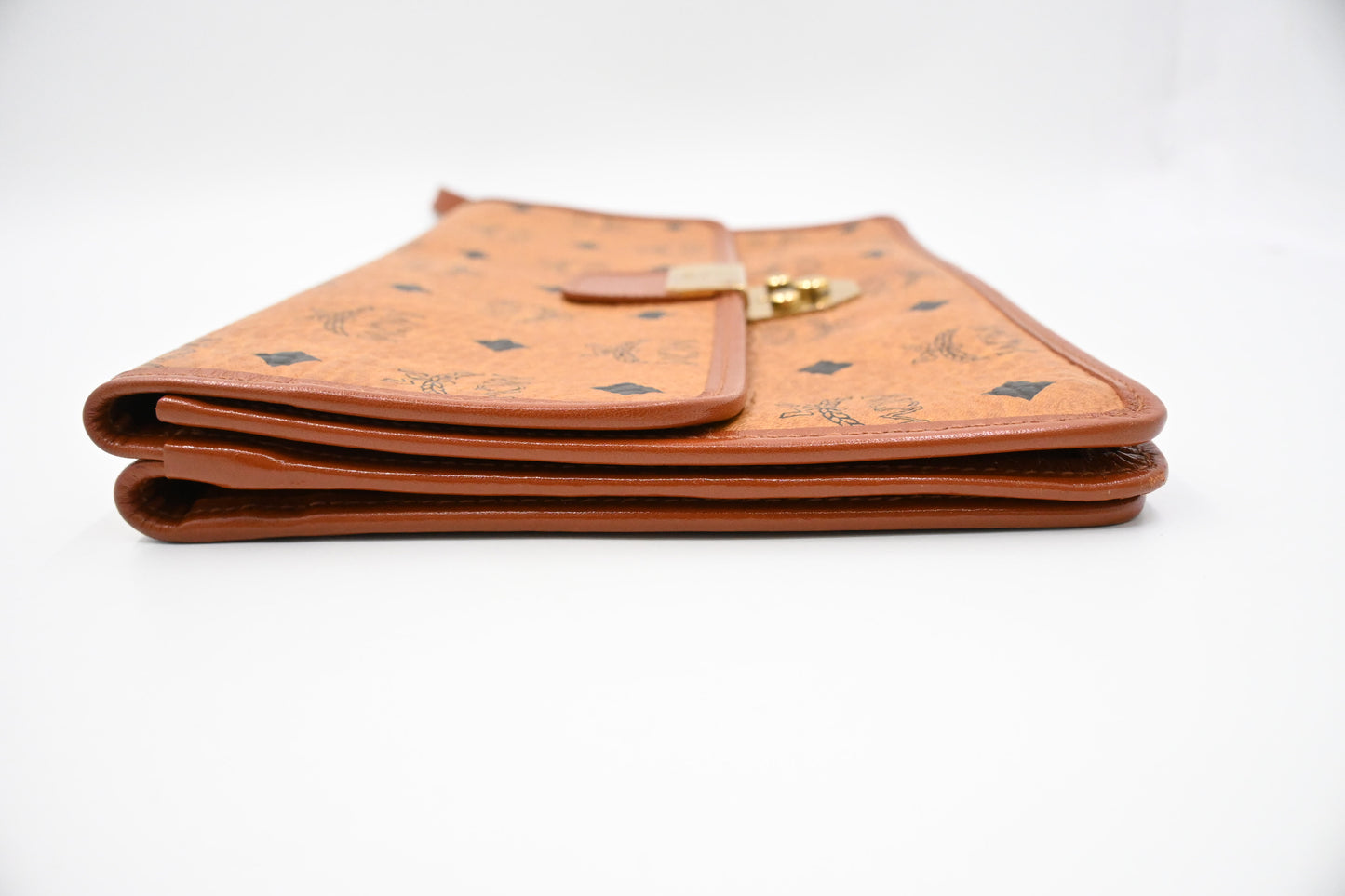 MCM Clutch Bag in Cognac Visetos Canvas