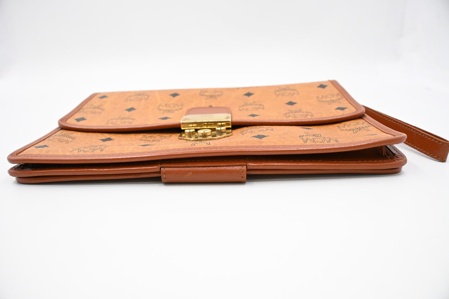 MCM Clutch Bag in Cognac Visetos Canvas