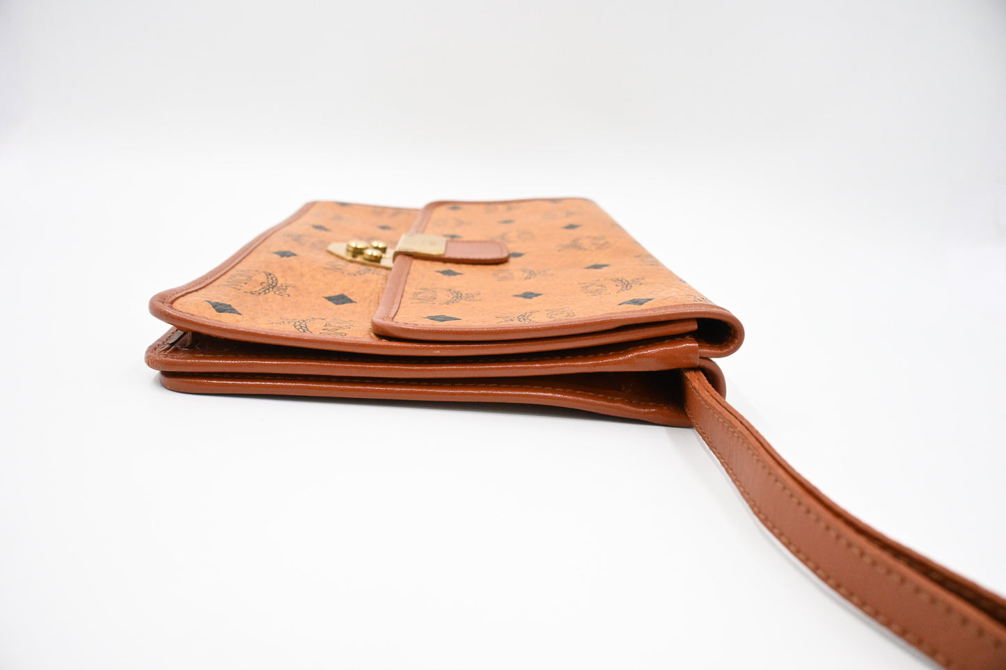 MCM Clutch Bag in Cognac Visetos Canvas