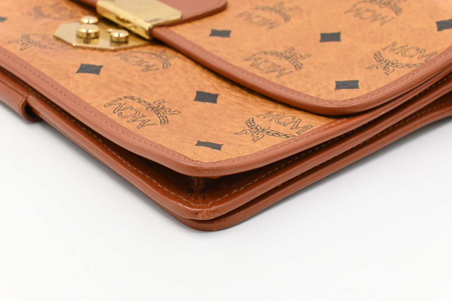 MCM Clutch Bag in Cognac Visetos Canvas