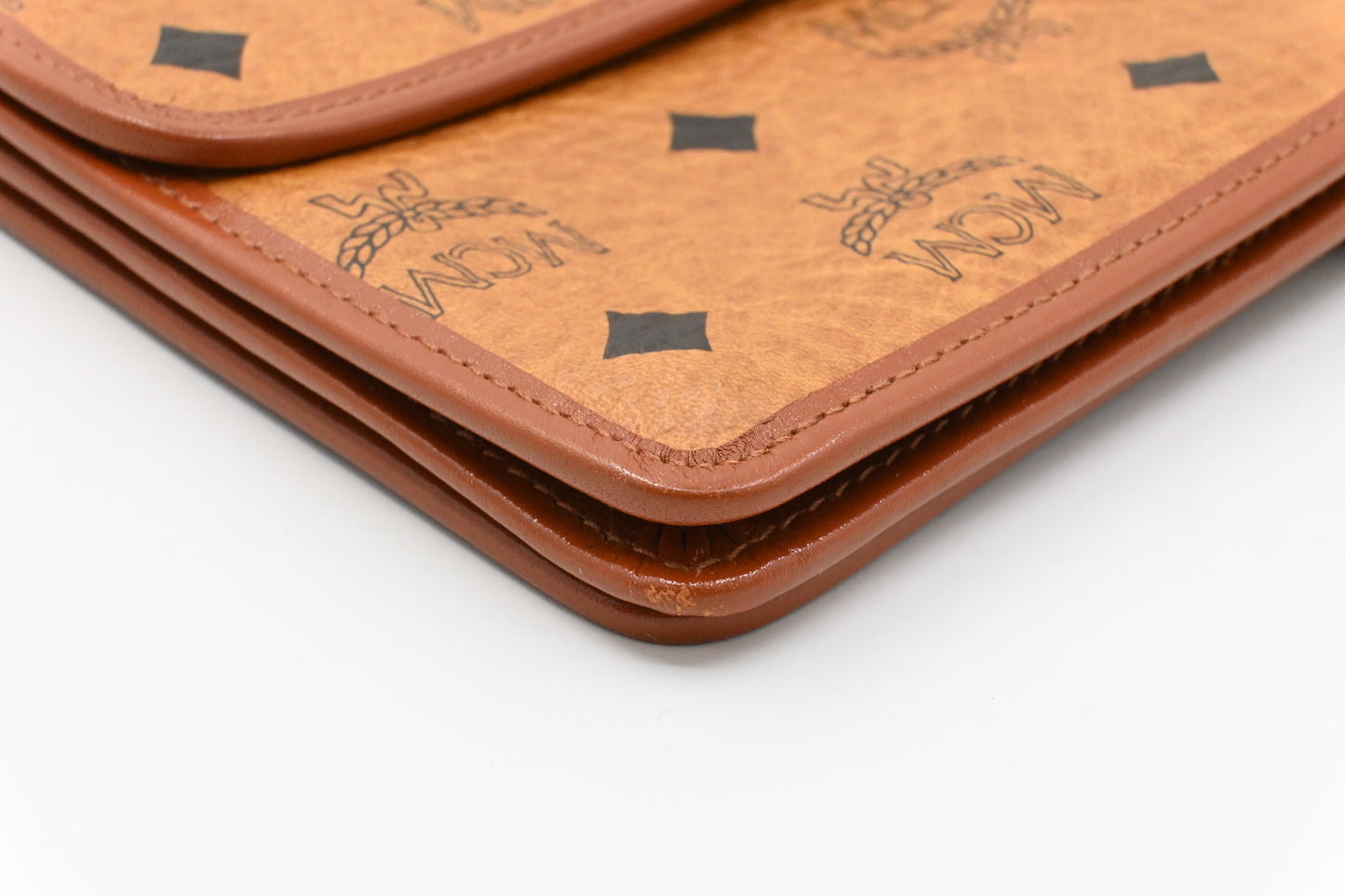 MCM Clutch Bag in Cognac Visetos Canvas