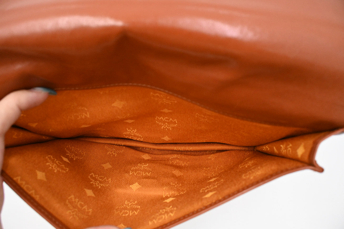 MCM Clutch Bag in Cognac Visetos Canvas