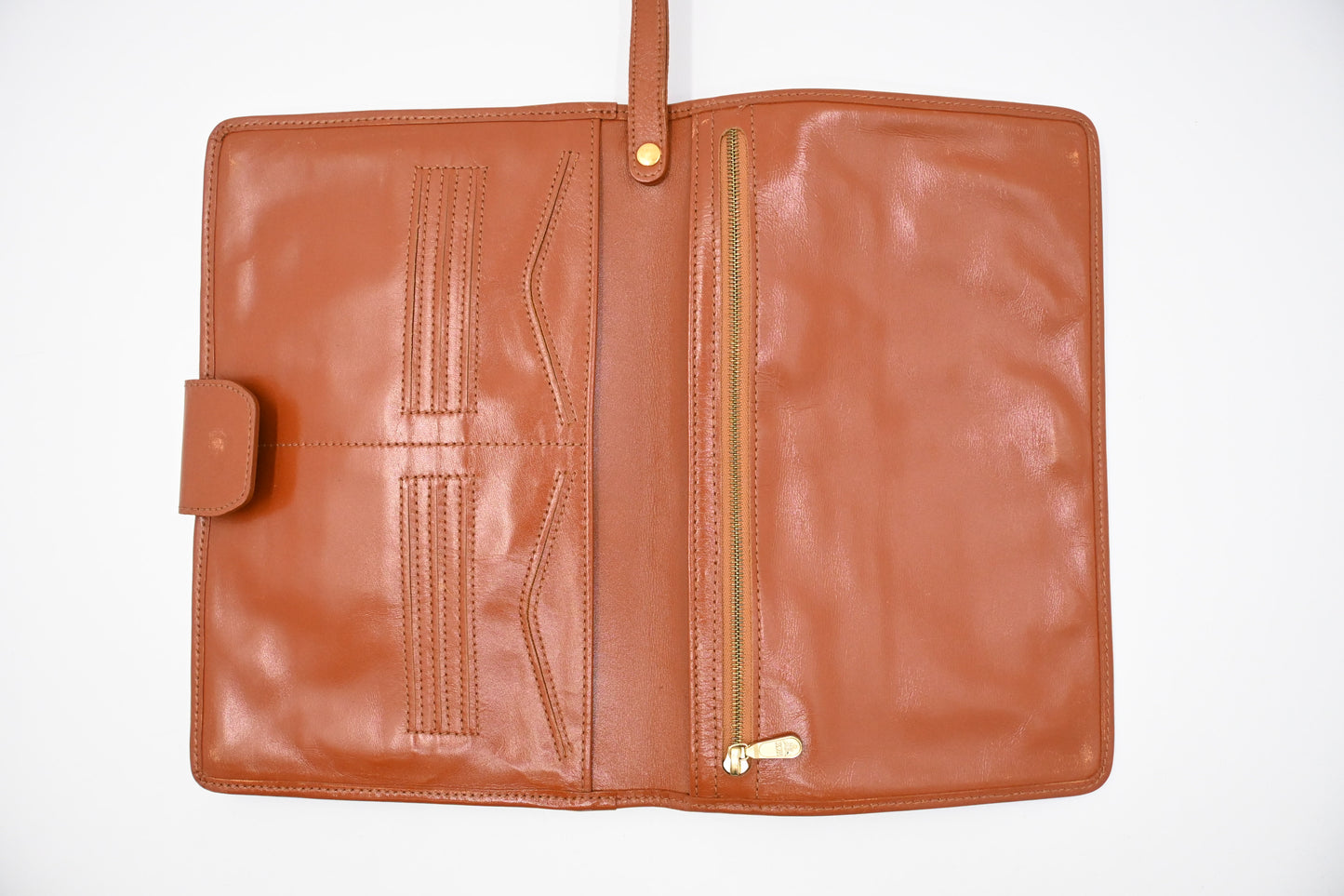 MCM Clutch Bag in Cognac Visetos Canvas