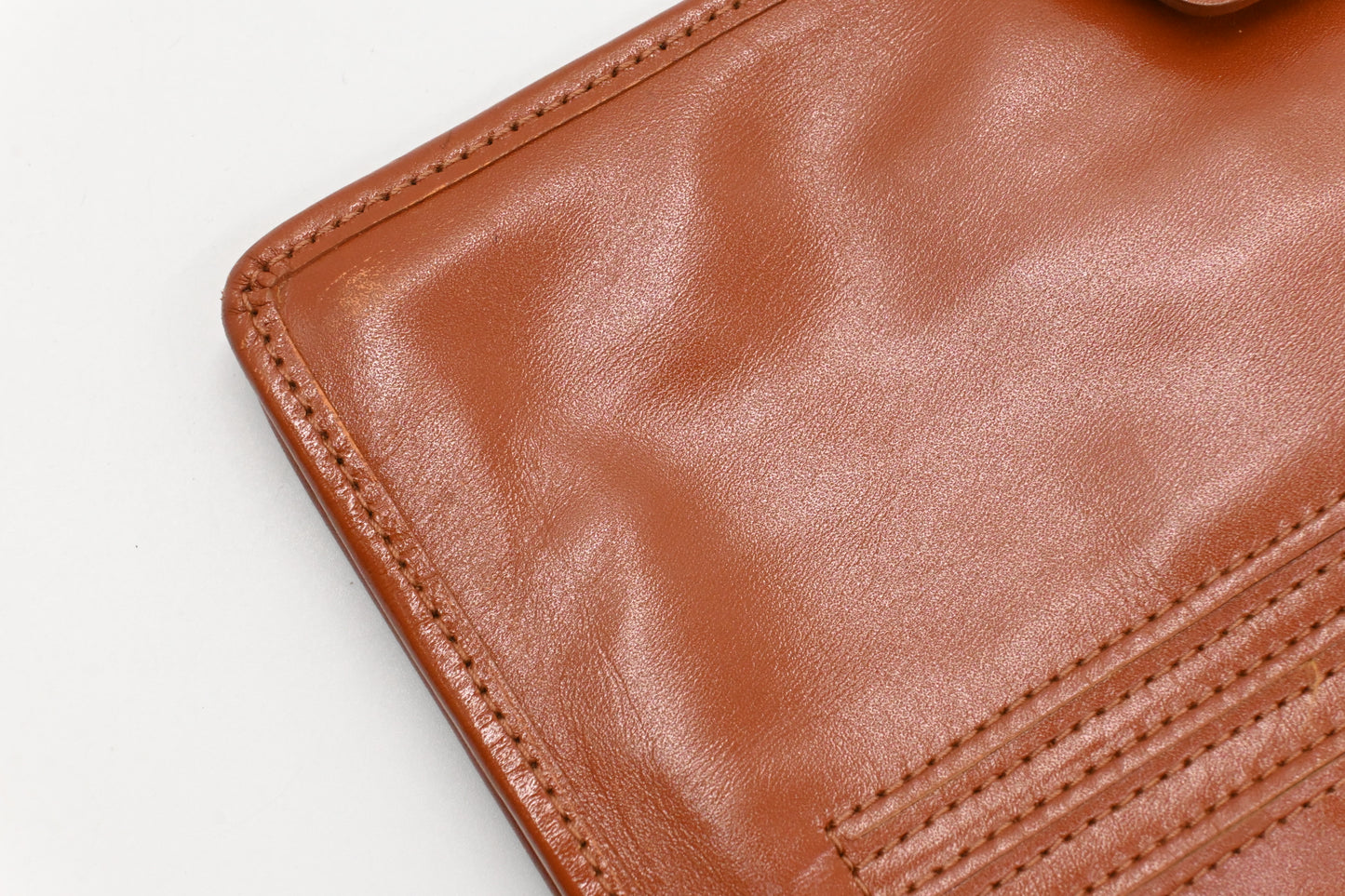 MCM Clutch Bag in Cognac Visetos Canvas
