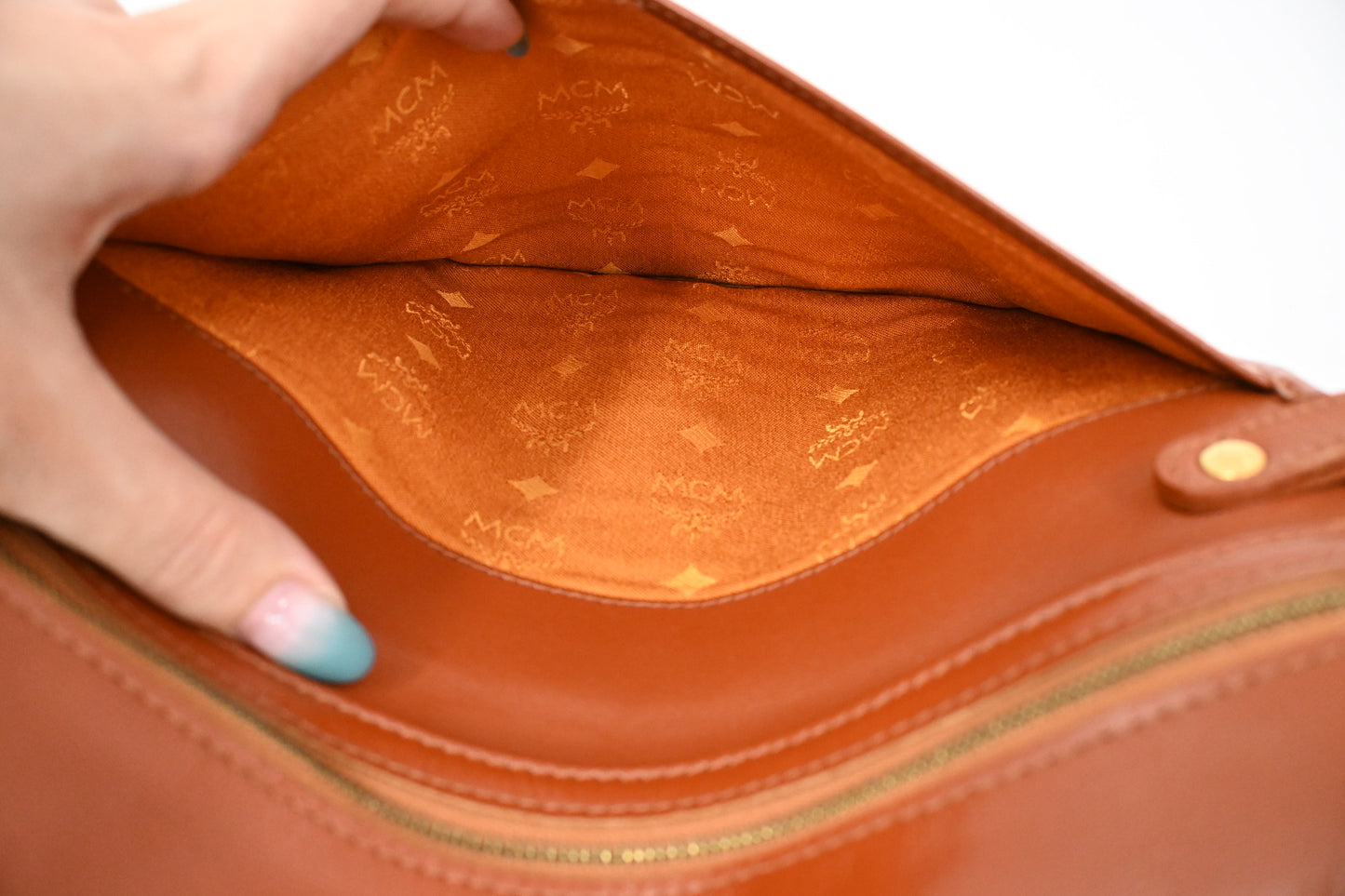 MCM Clutch Bag in Cognac Visetos Canvas