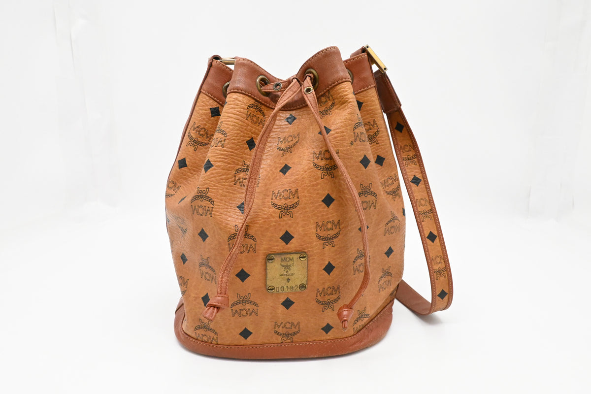 MCM Bucket Bag in Cognac Visetos Canvas