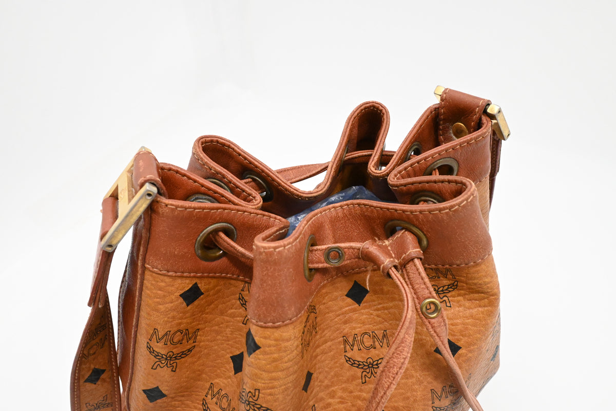 MCM Bucket Bag in Cognac Visetos Canvas