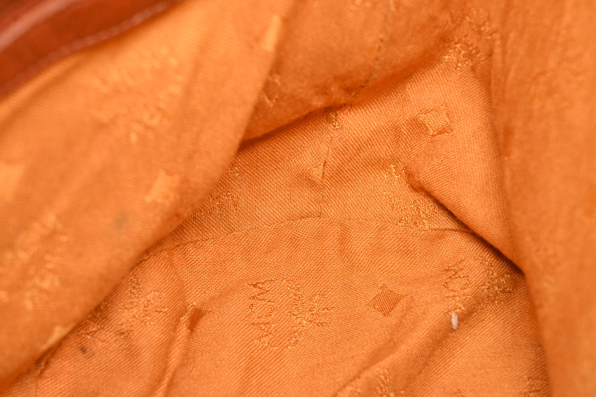 MCM Bucket Bag in Cognac Visetos Canvas