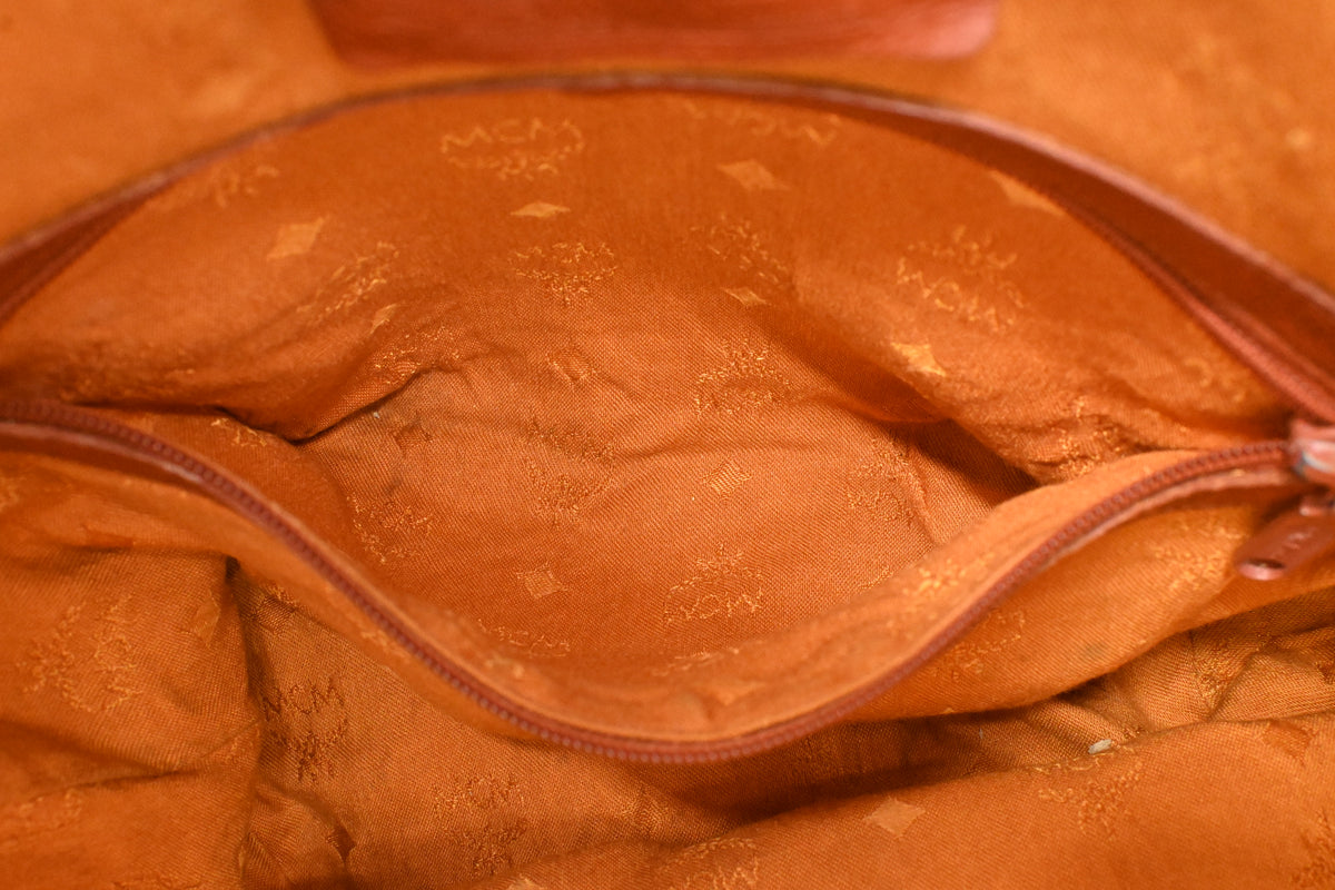 MCM Bucket Bag in Cognac Visetos Canvas