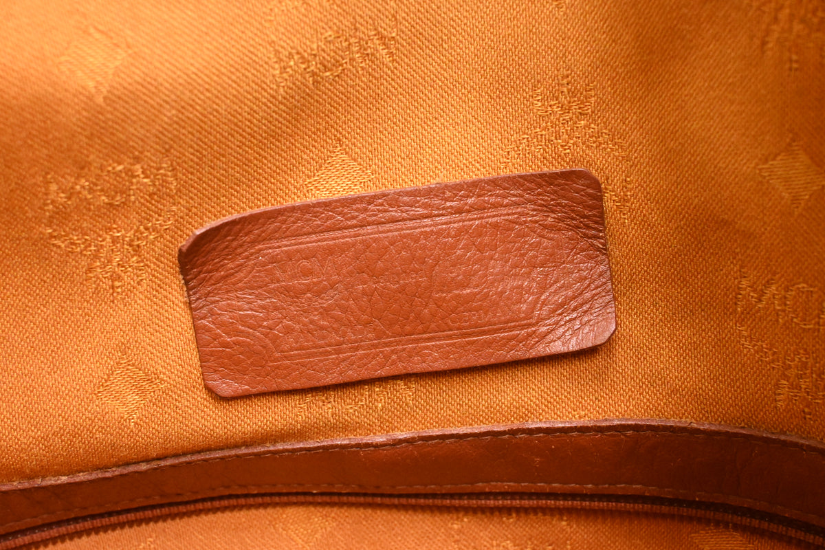MCM Bucket Bag in Cognac Visetos Canvas