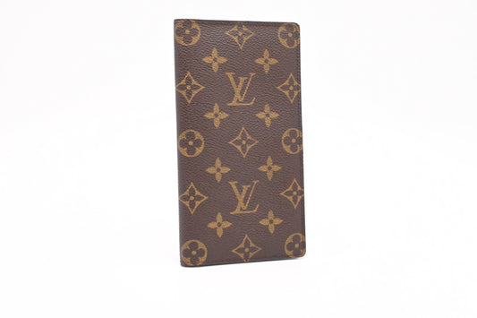 Louis Vuitton Vertical Bifold Wallet in Monogram Canvas