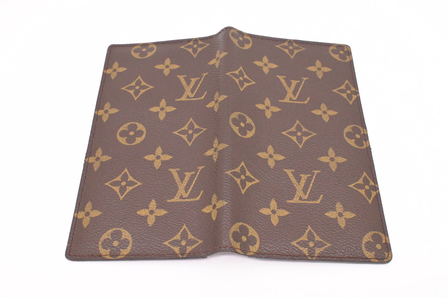 Louis Vuitton Vertical Bifold Wallet in Monogram Canvas