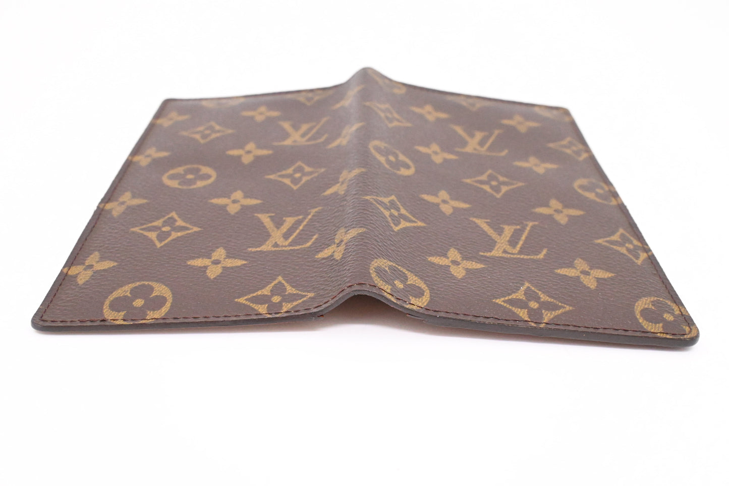 Louis Vuitton Vertical Bifold Wallet in Monogram Canvas