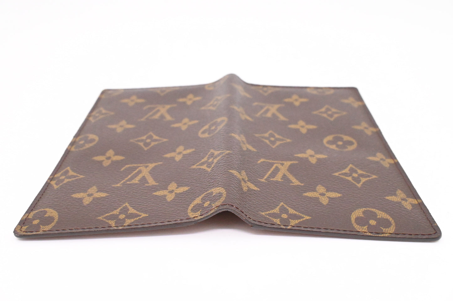 Louis Vuitton Vertical Bifold Wallet in Monogram Canvas