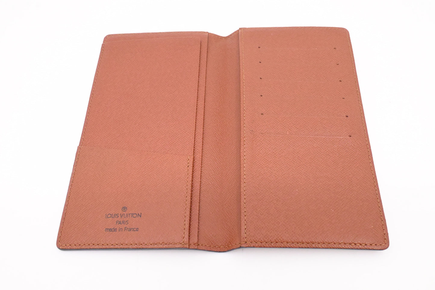 Louis Vuitton Vertical Bifold Wallet in Monogram Canvas