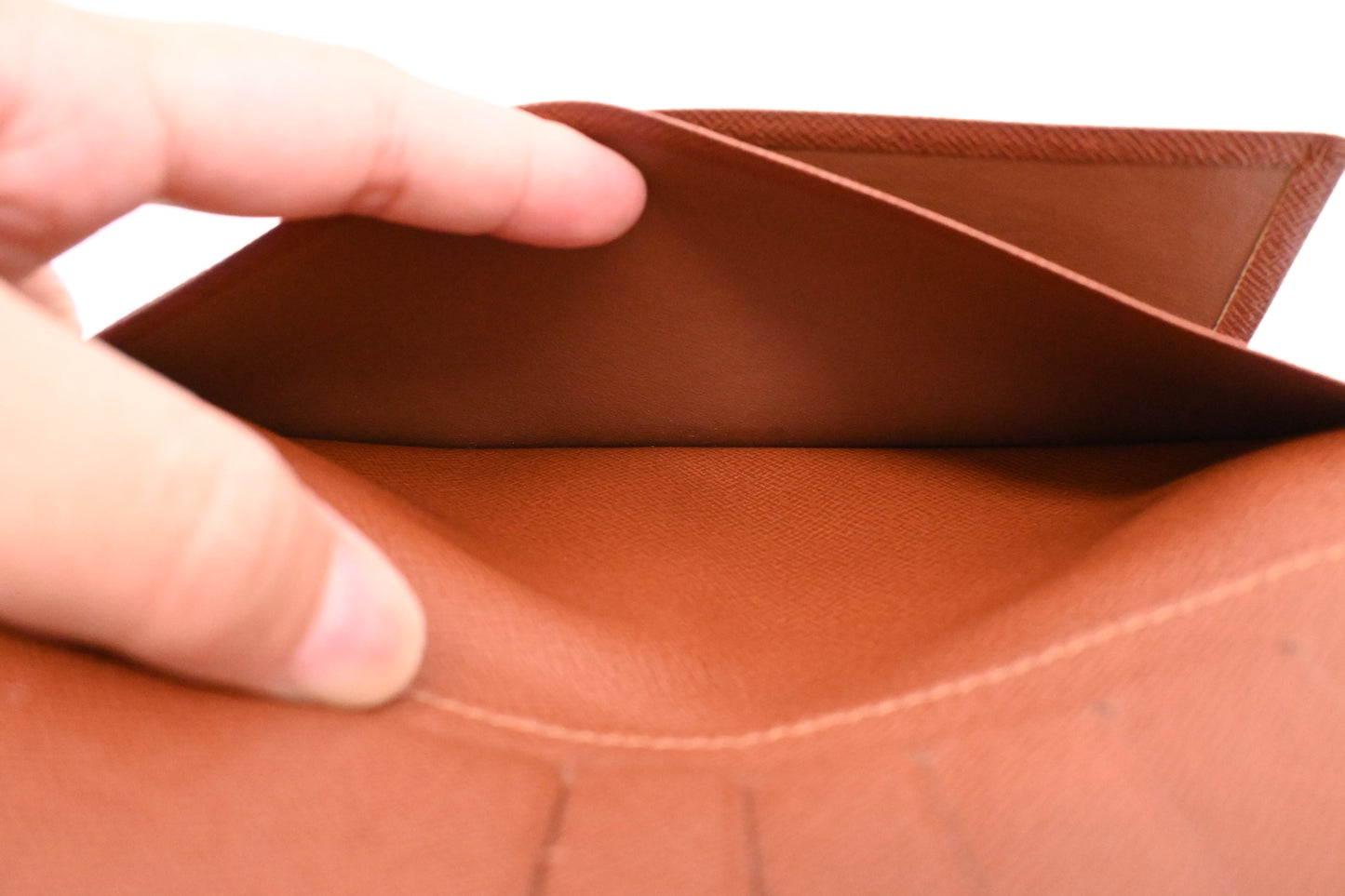 Louis Vuitton Vertical Bifold Wallet in Monogram Canvas