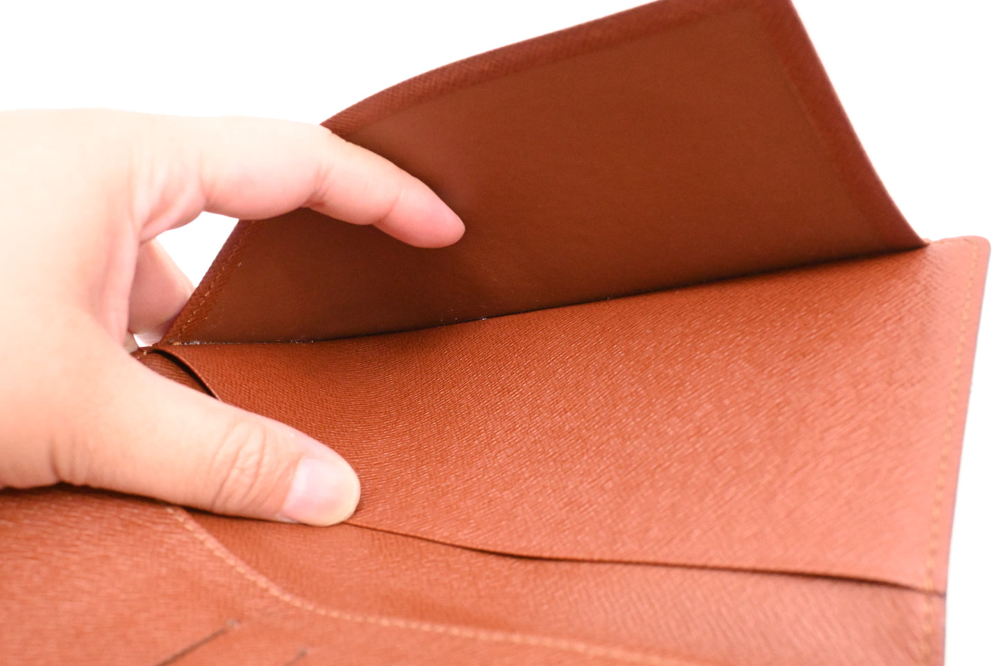 Louis Vuitton Vertical Bifold Wallet in Monogram Canvas