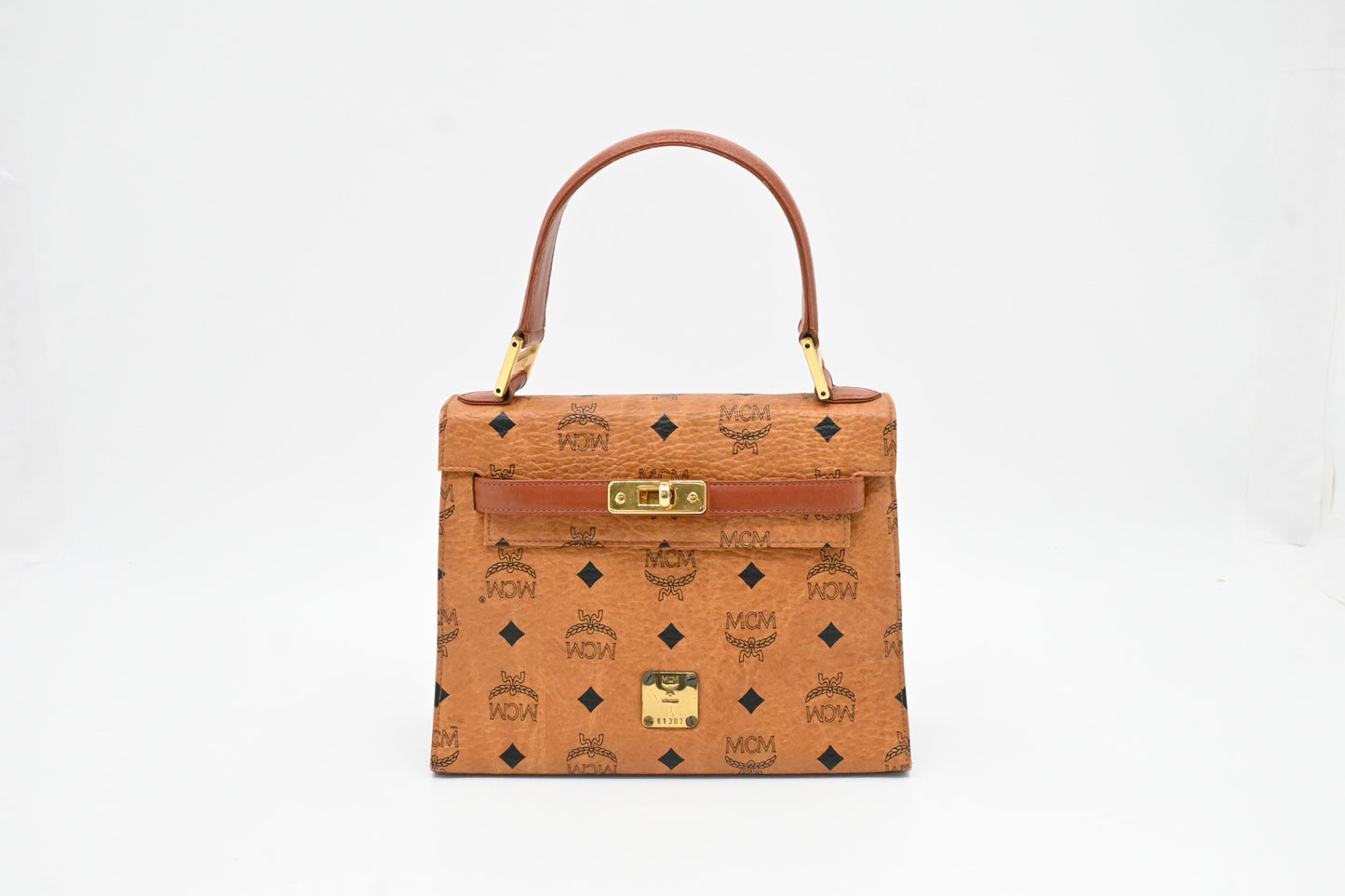 MCM Mini Kelly in Cognac Visetos Canvas