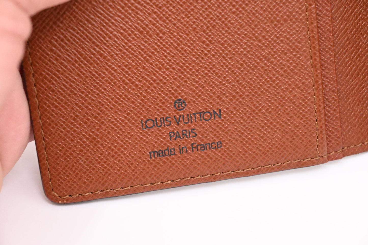 Louis Vuitton Vertical Bifold Wallet in Monogram Canvas
