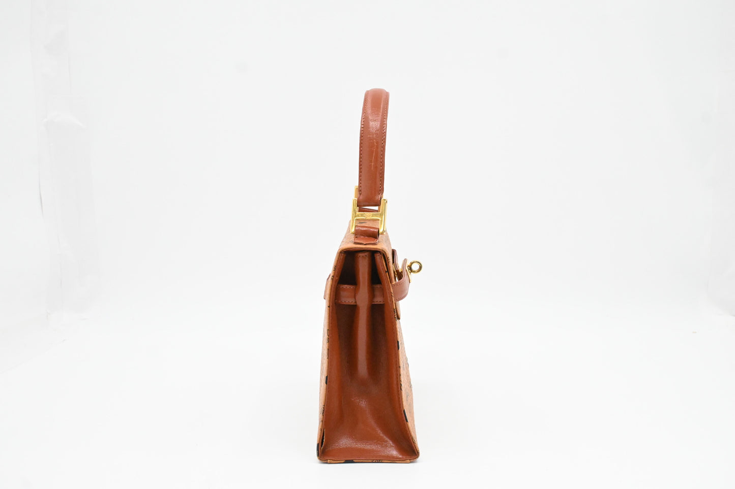 MCM Mini Kelly in Cognac Visetos Canvas