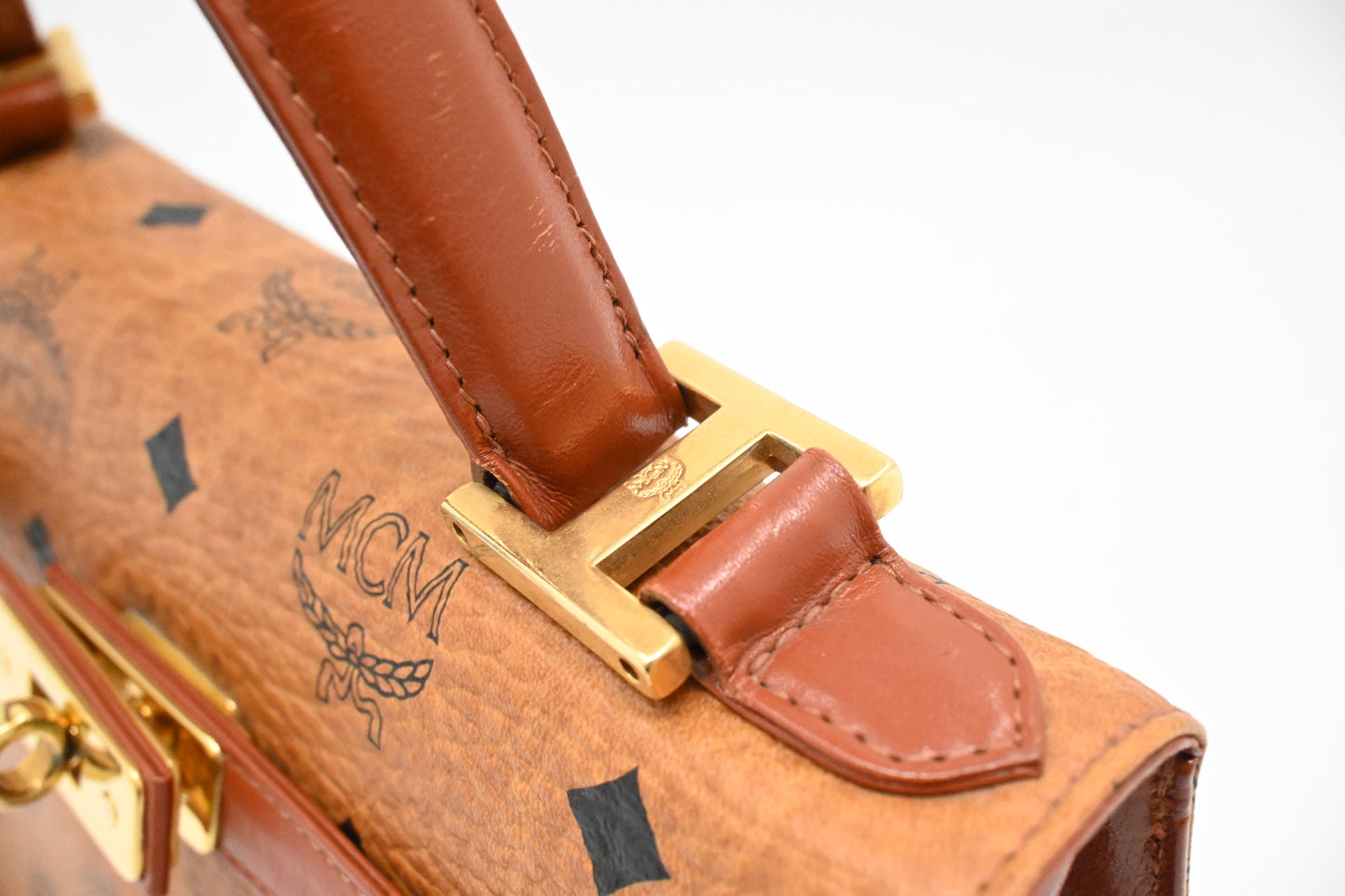 MCM Mini Kelly in Cognac Visetos Canvas