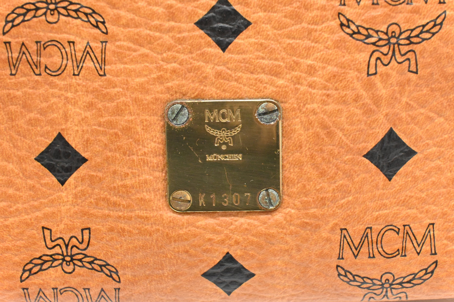 MCM Mini Kelly in Cognac Visetos Canvas