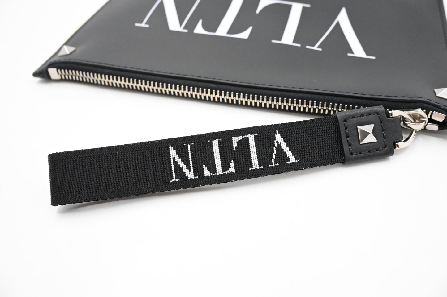 Valentino Clutches in Clean PVC and Black Leather