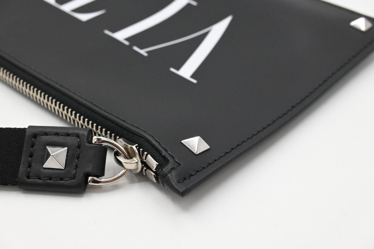 Valentino Clutches in Clean PVC and Black Leather