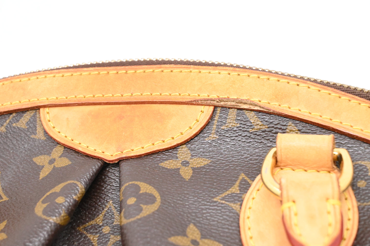 Louis Vuitton Tivoli PM in Monogram Canvas