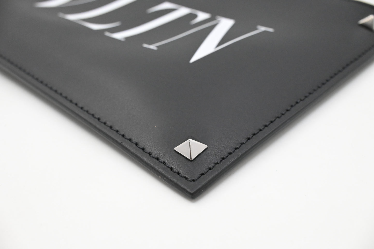 Valentino Clutches in Clean PVC and Black Leather