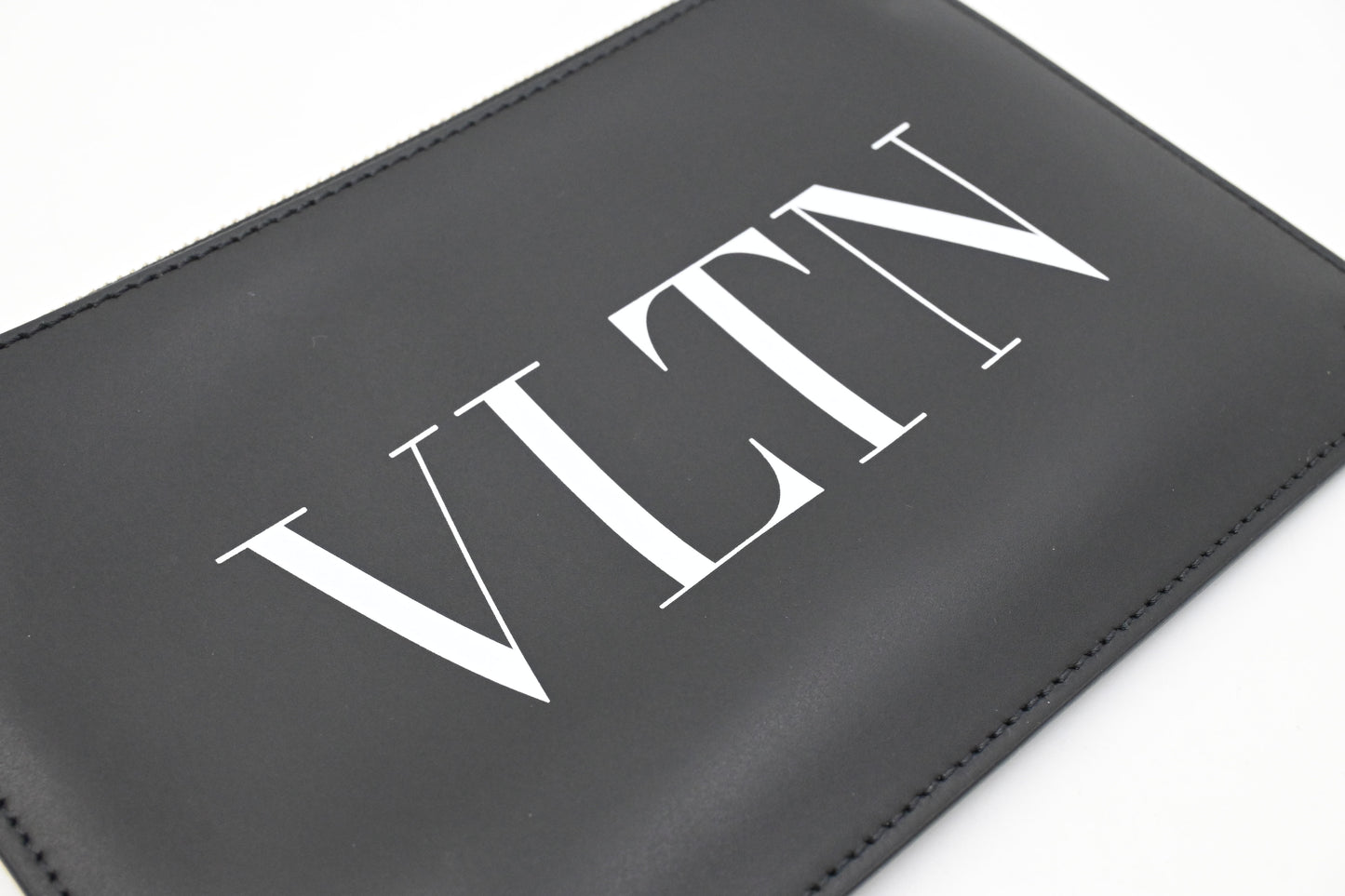 Valentino Clutches in Clean PVC and Black Leather