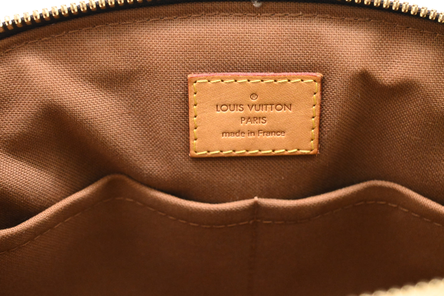 Louis Vuitton Tivoli PM in Monogram Canvas