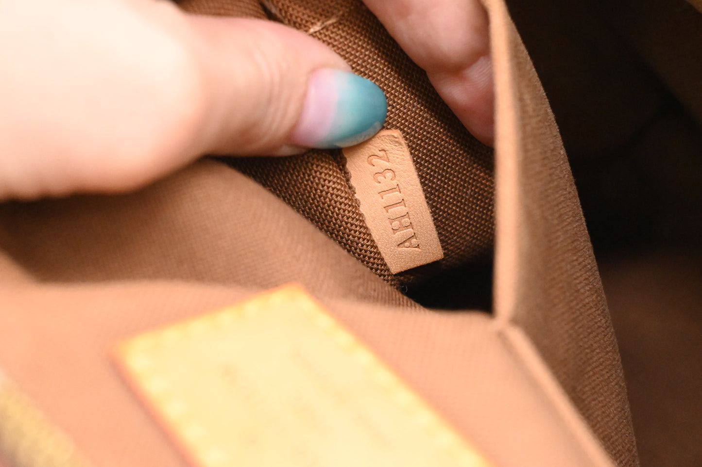 Louis Vuitton Tivoli PM in Monogram Canvas