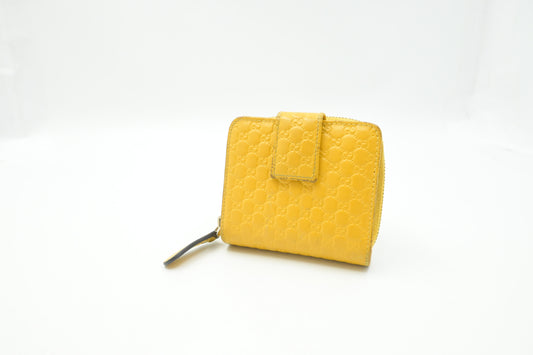 Gucci Compact Wallet in Yellow Microguccissima Leather