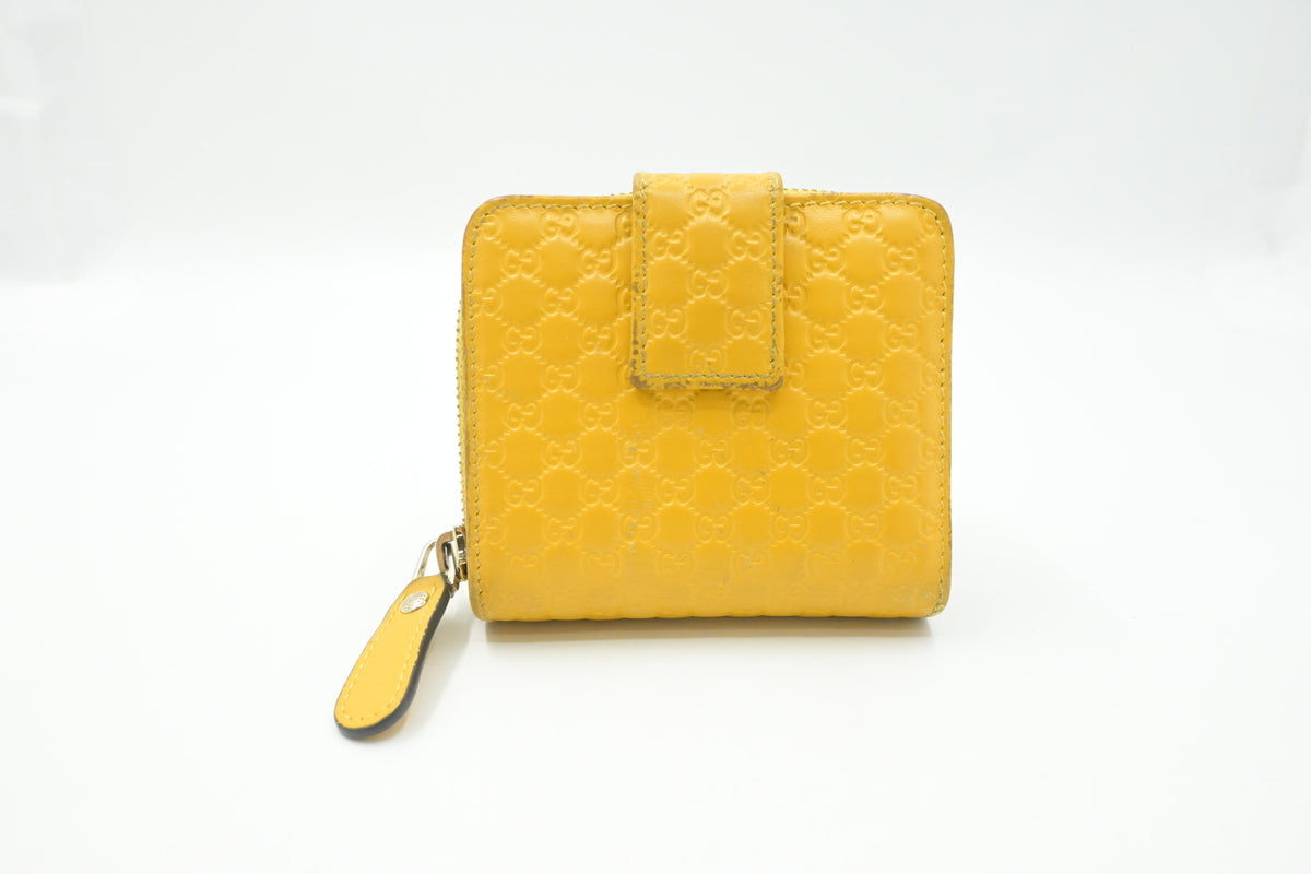 Gucci Compact Wallet in Yellow Microguccissima Leather