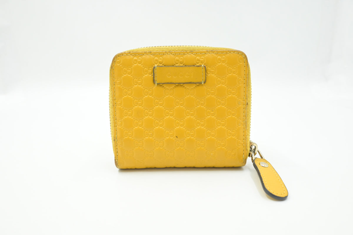 Gucci Compact Wallet in Yellow Microguccissima Leather