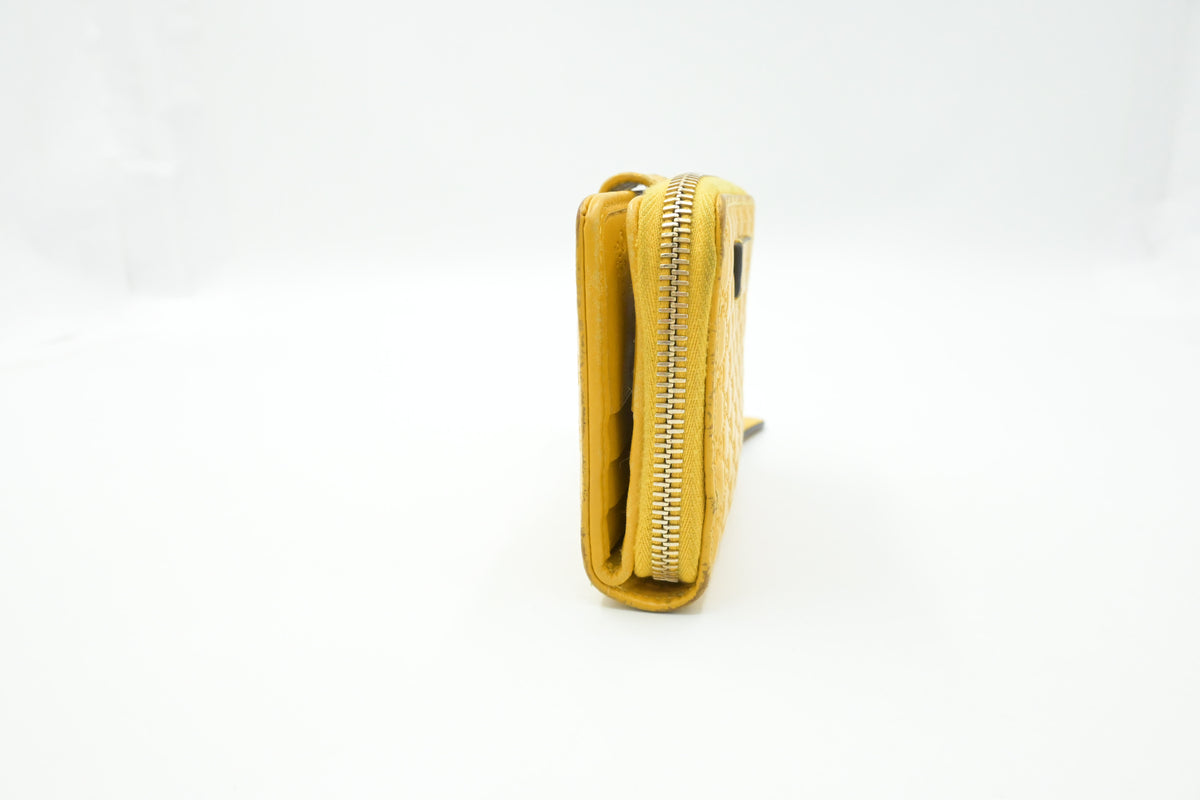 Gucci Compact Wallet in Yellow Microguccissima Leather